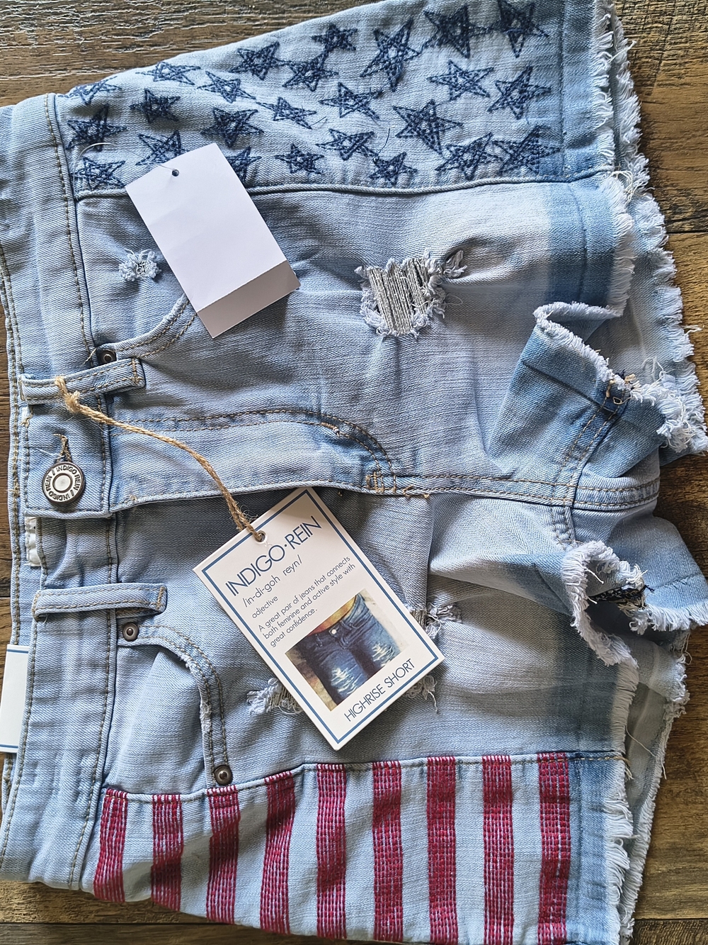 Indigo Rein Light Blue High-Rise Distressed Denim Shorts with Red Stripe Detail